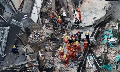 Nine workers trapped in Shanghai roof collapse: govt Nine workers trapped in Shanghai roof collapse: govt