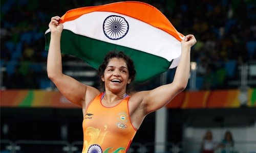 Sakshi Malik’s family celebrate the bronze medal win Sakshi Malik’s family celebrate the bronze medal win