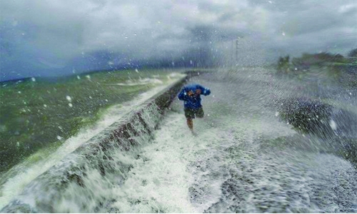 Filipinos in Bahrain are worried over typhoon back home Filipinos in Bahrain are worried over typhoon back home