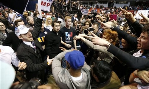 Trump under fire from rivals for rally violence Trump under fire from rivals for rally violence