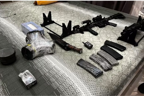 Thai police probe weapons cache at Chinese man's home