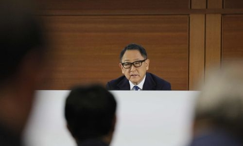 Toyota apologises for scandals as vehicle sales set new record