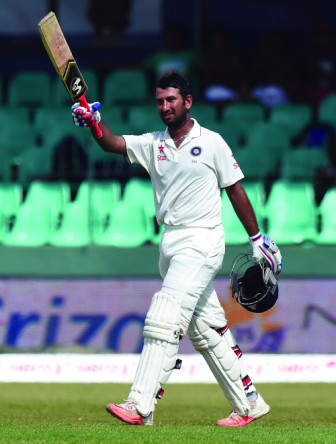 Pujara’s ton lifts India Pujara’s ton lifts India