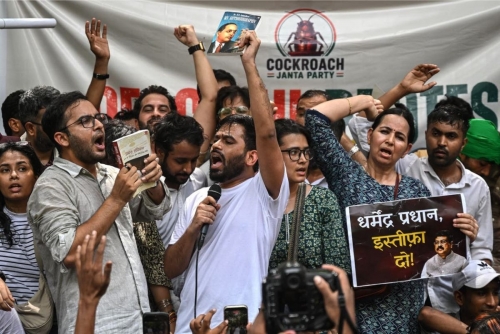 Thousands March in Delhi Over Exam Leak Allegations, Demand Minister's Resignation Thousands March in Delhi Over Exam Leak Allegations, Demand Minister's Resignation