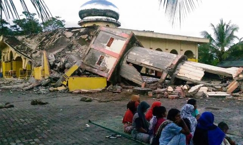 Indonesia quake toll jumps to 97 as more bodies found in rubble