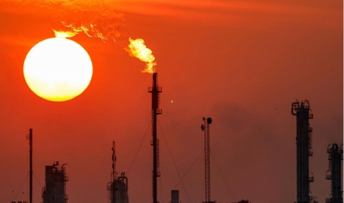 Oil prices slide after OPEC+ output hike